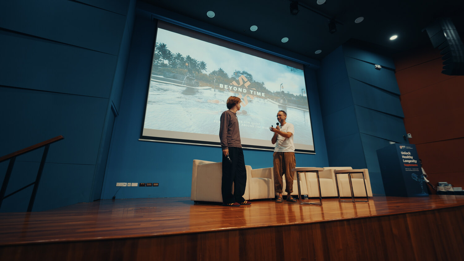 Healthy Longevity Singapore stage with Alek