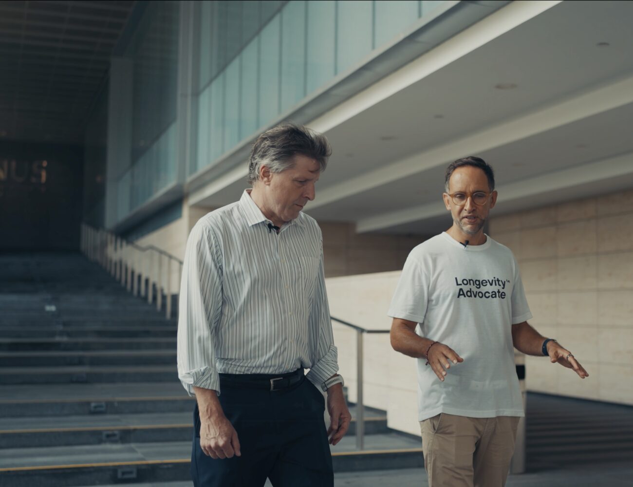 Marek walking with Brian Kennedy at NUS, Singapore