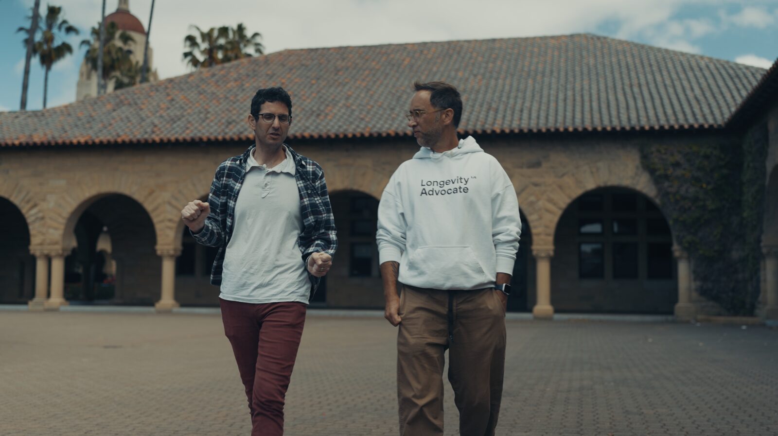 Marek walking with Yochai Shavit at Stanford, California