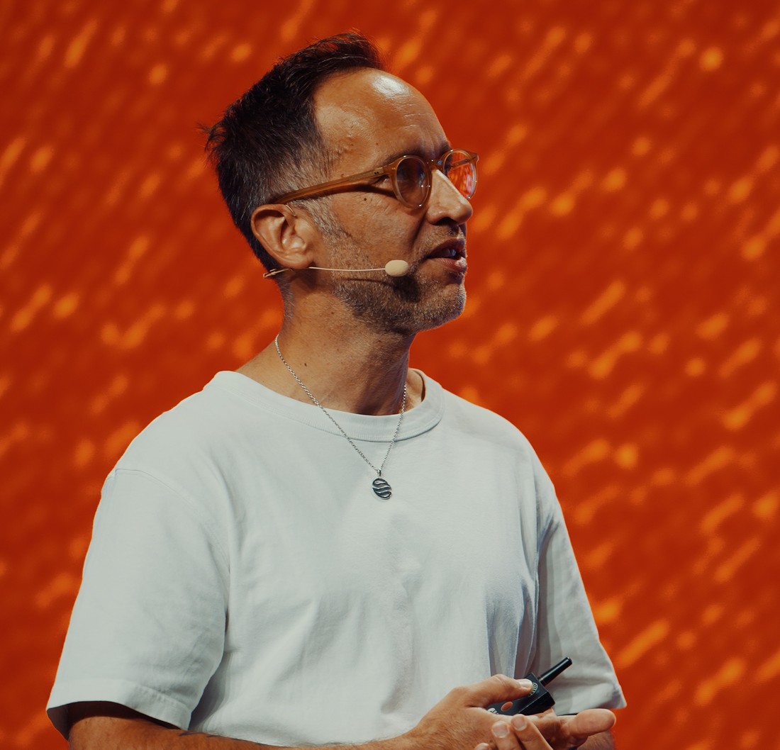 Marek on stage at the Life Summit