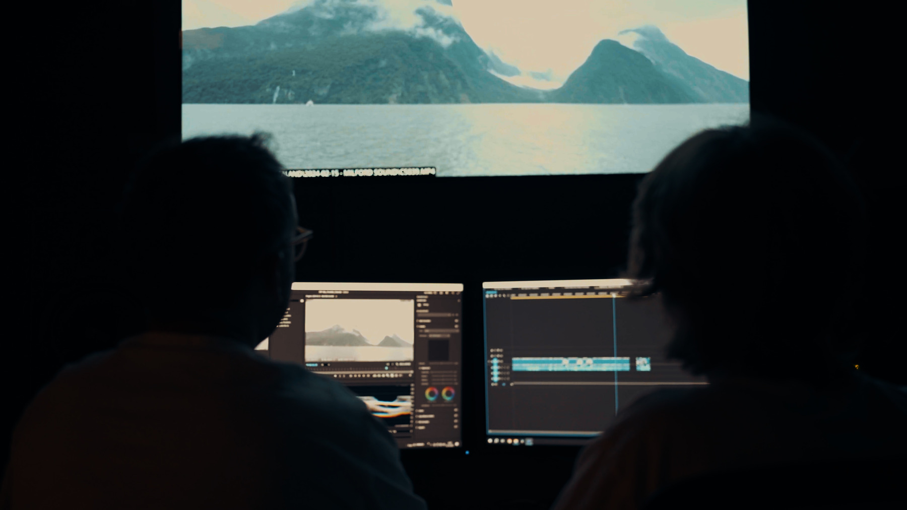 Marek and Aleksander in the edit room, watching footage from Milford Sound, New Zealand