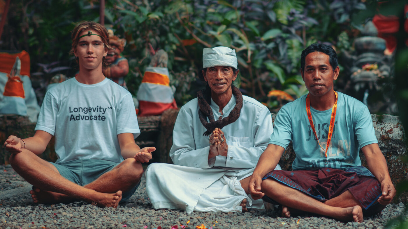 Sitting with a local guide and a priest in Bali
