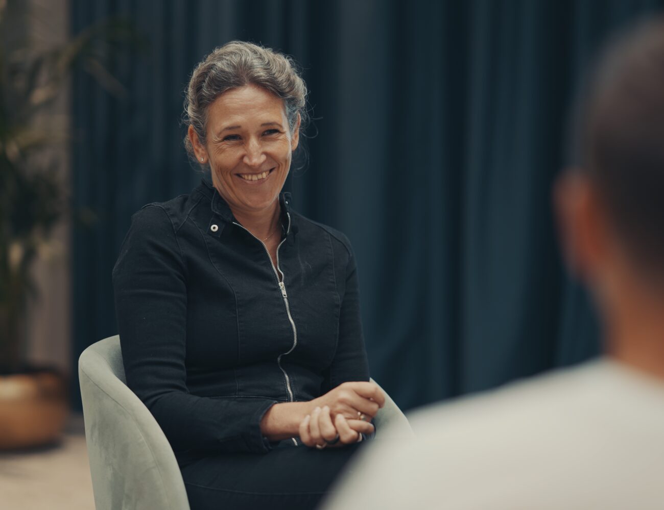 Andrea Maier smiling during the Live Beyond interview