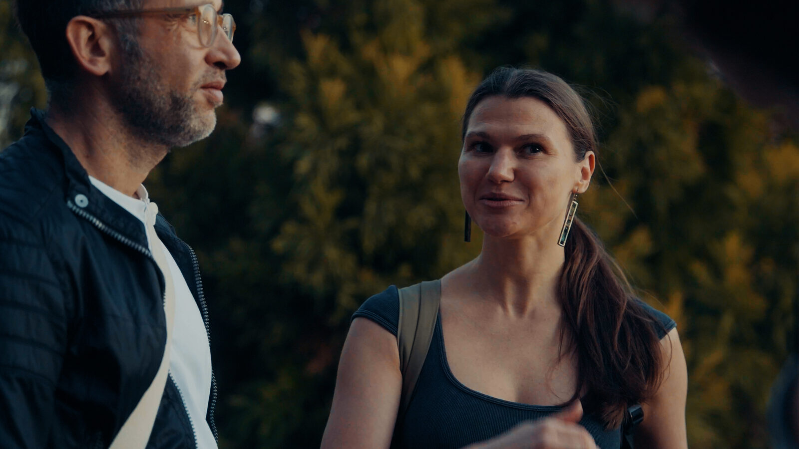 Marek and Aryana Apanaska talking at golden hour in New York