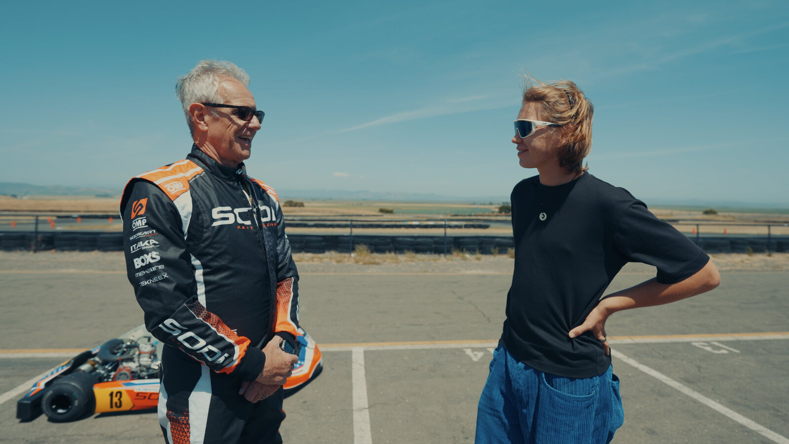 Eric with Alek at the racetrack