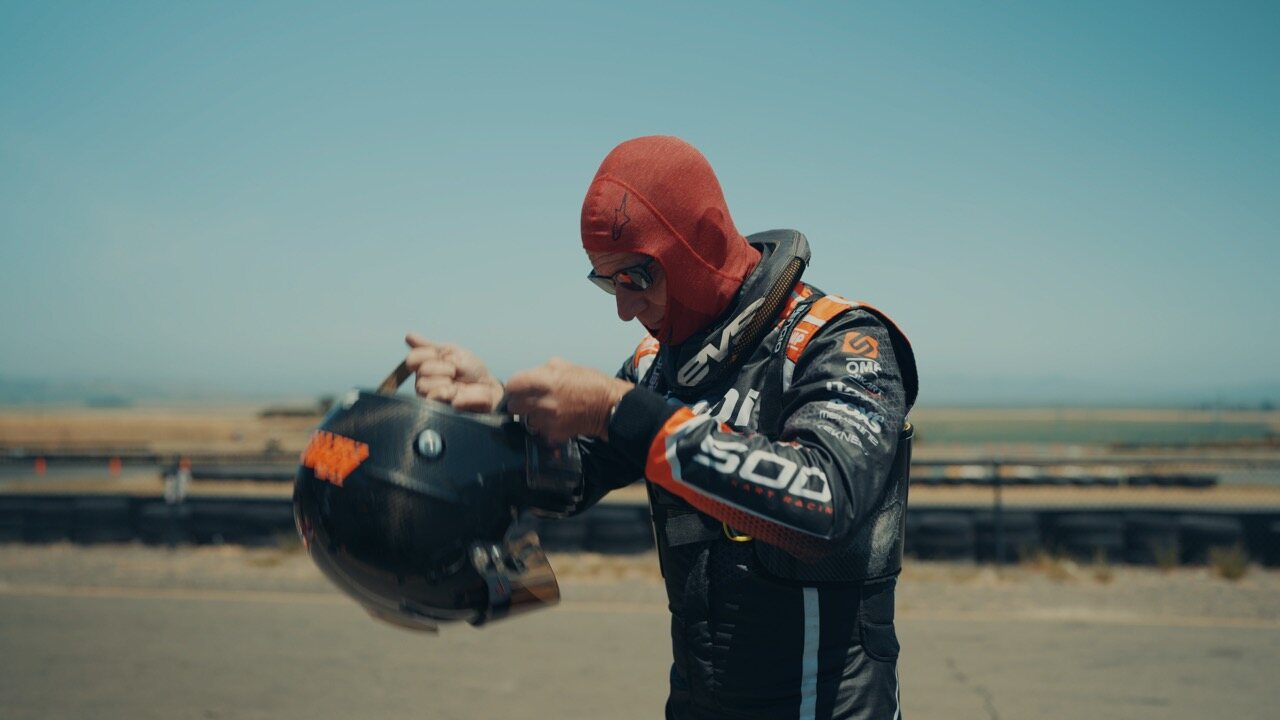 Eric Verdin in racing gear at the track