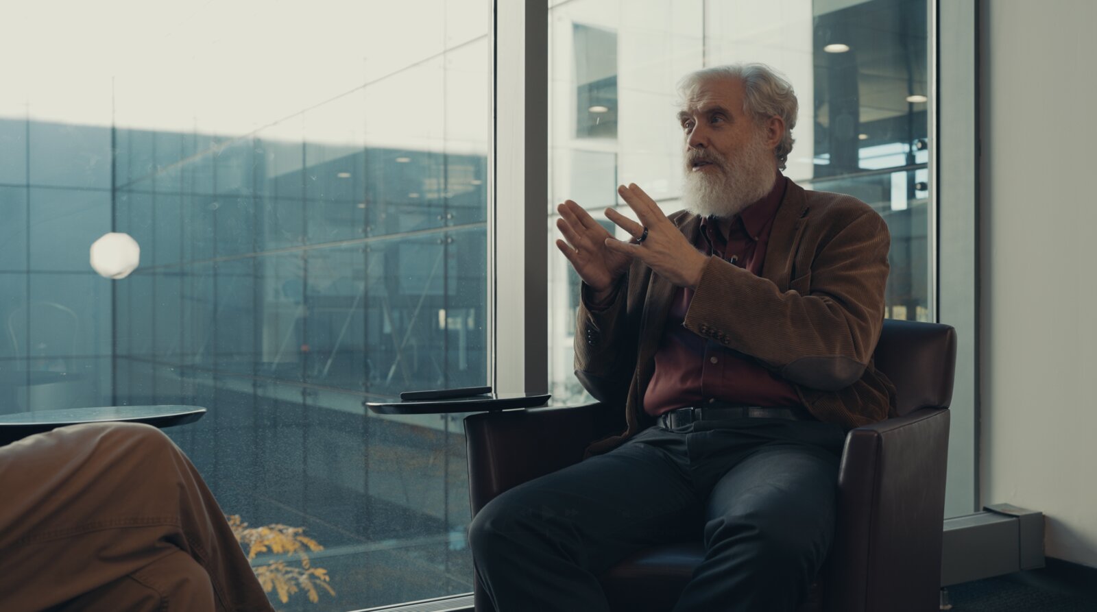 George Church in vivid discussion during the Live Beyond interview at Harvard