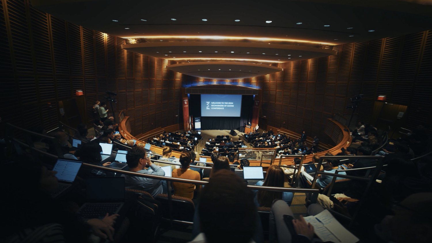 The packed auditorium at the Biomarkers of Aging conference at Harvard, 2024