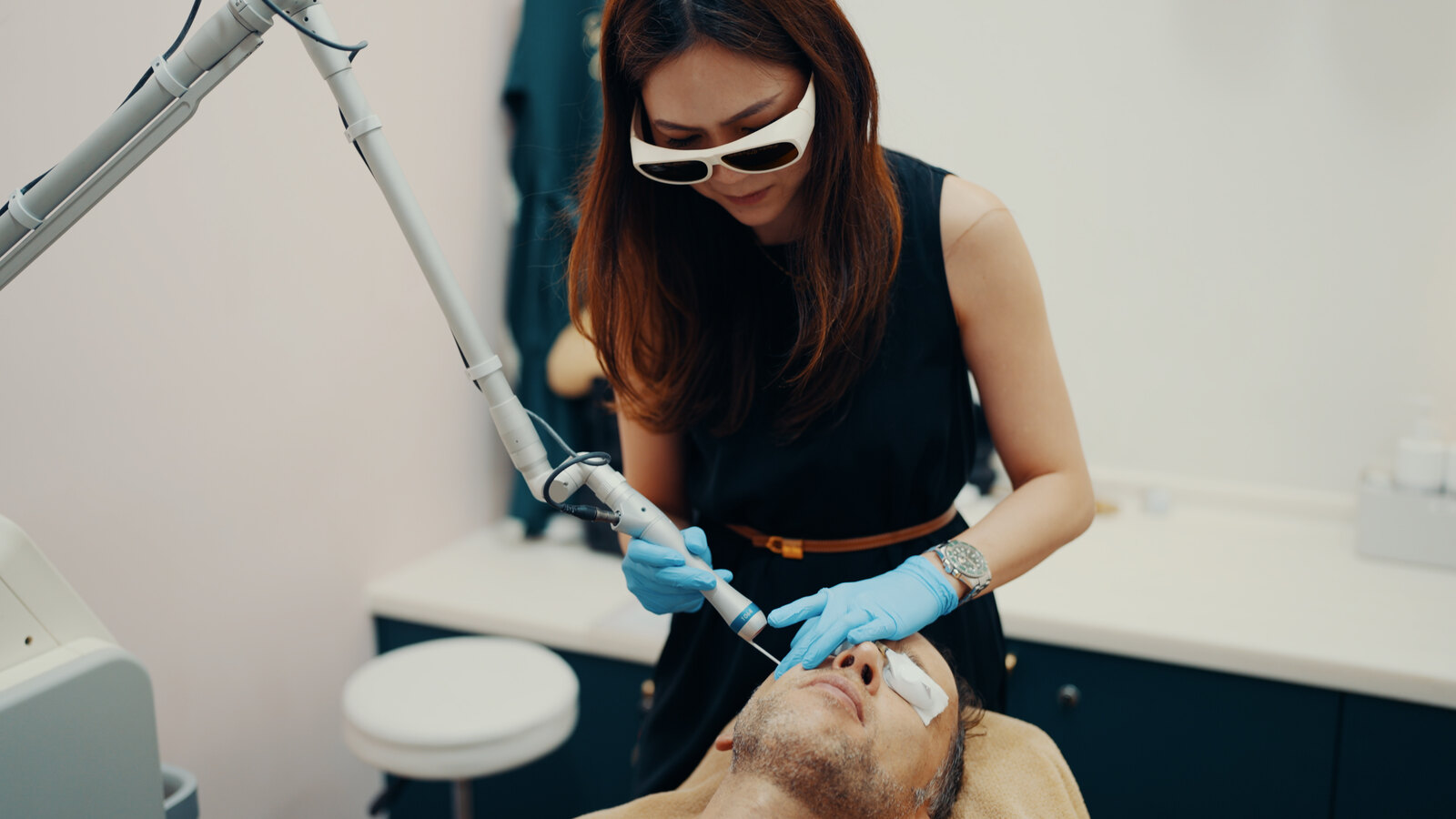 Kathryn Koh at work with laser equipment