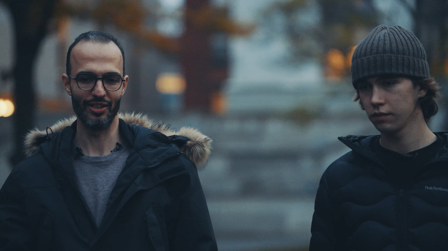 Mahdi Moqri talking with Aleksander Piotrowski in Boston
