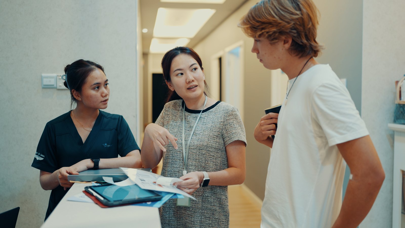 Aleksander Piotrowski with clinic staff at Michael Lim's clinic in Kuala Lumpur