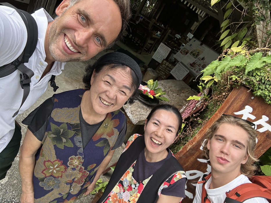 Marek and Aleksander Piotrowski with Emi-san and her helper outside Emi no Mise, Ogimi, Okinawa