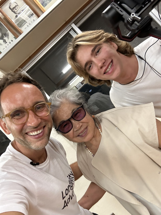 Marek and Aleksander Piotrowski with Eiko at the community centre in Ogimi, Okinawa