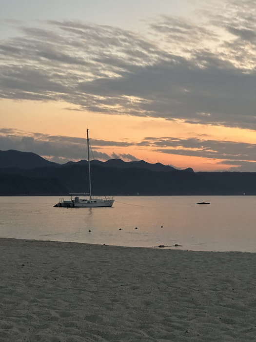 A yacht anchored in the bay at sunset, Nanjo, Okinawa