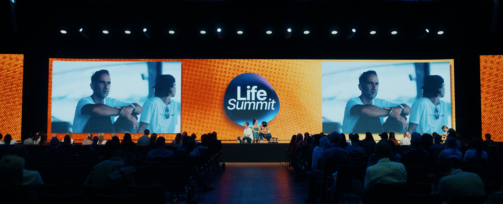 Olivia Lesslar, Marek and Valerie sharing the stage at LifeSummit Berlin