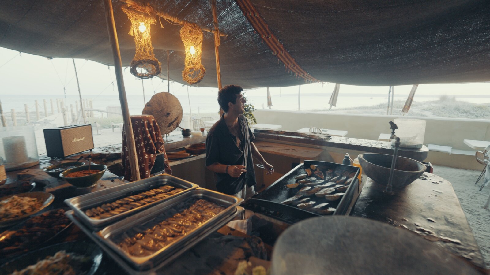 The beachside kitchen at Can7 on Formentera with healthy food being prepared