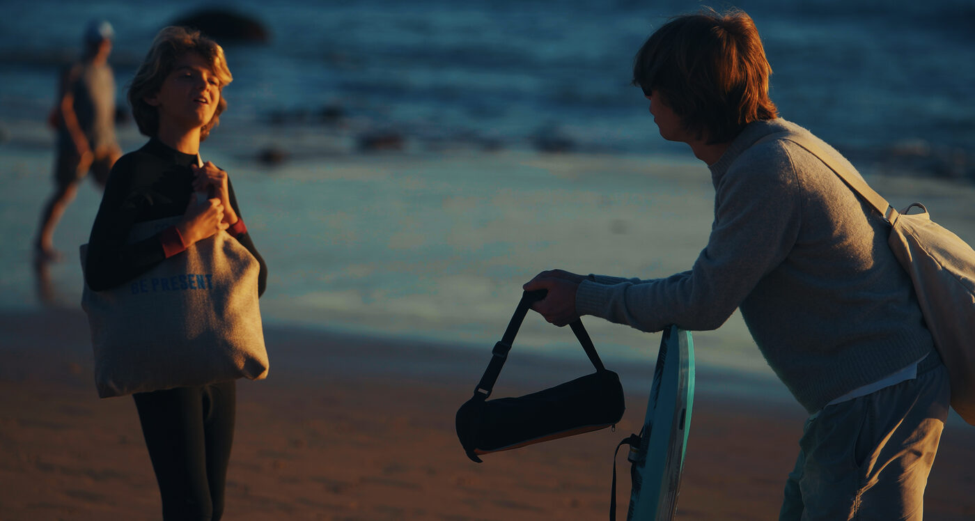Two families on the beach in Irvine at sunset