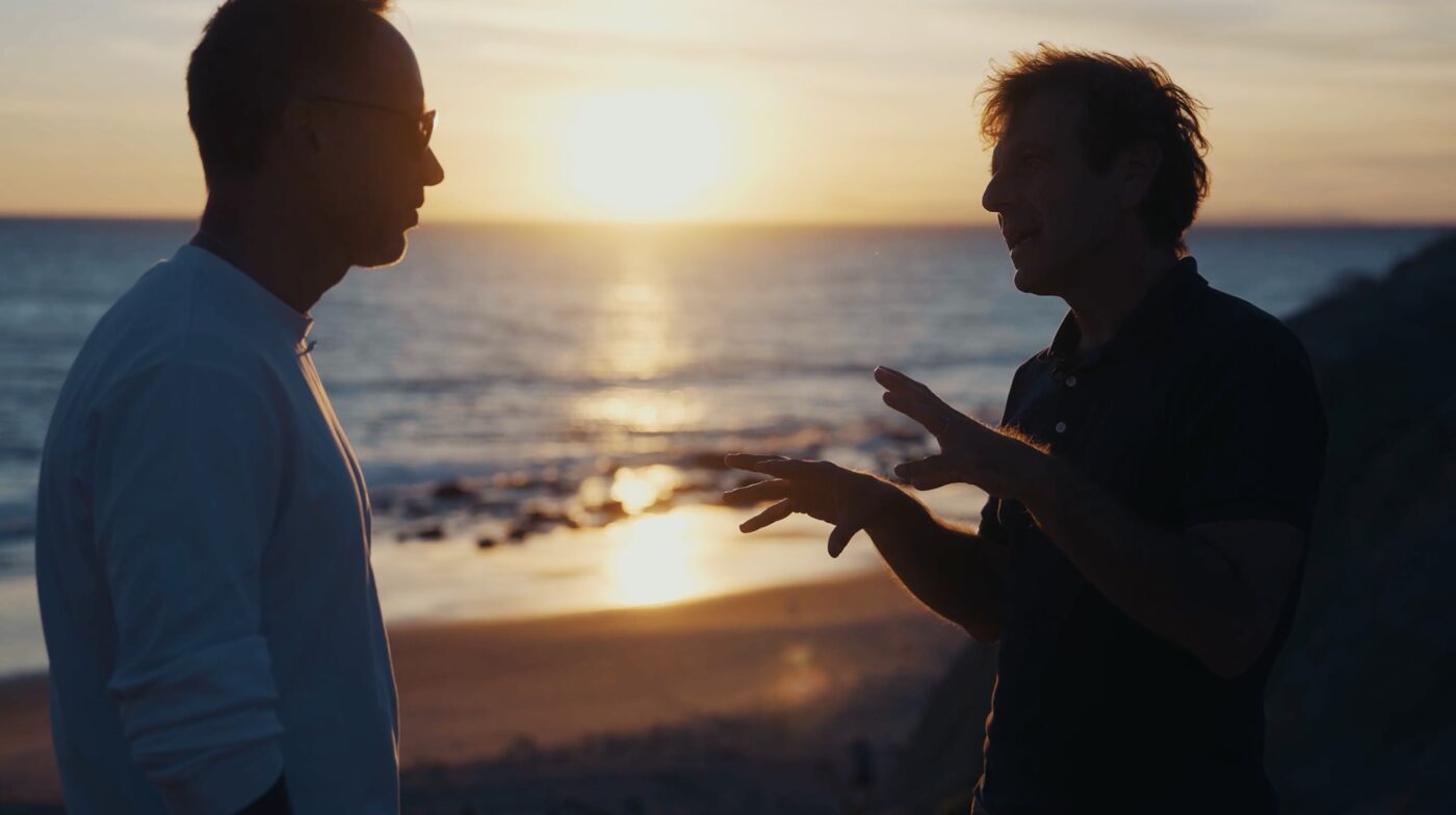 Vittorio Sebastiano and Marek in conversation on a cliff at sunset, Los Angeles